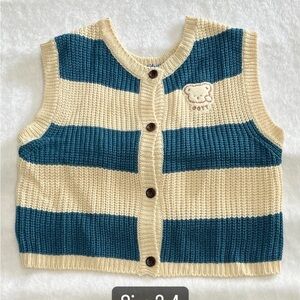 Blue and cream knit vest